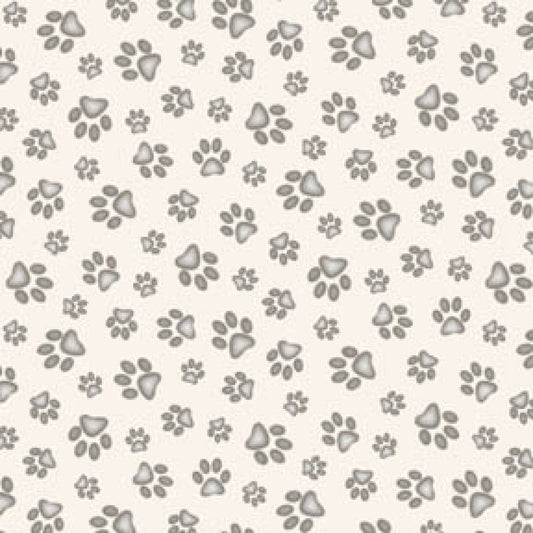 Cream Paw Prints all over cotton fabric by Elizabeths Studio