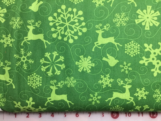 Snowflakes and Reindeer on Green 03296-44 Cotton Fabric Ho-Ho-Ho Let it Snow Collection from Benartex