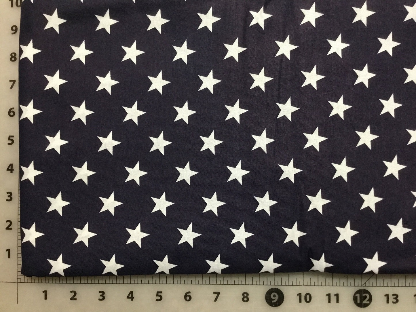 White Stars on Navy Background Patriotic Cotton Fabric from Checkers Fabrics