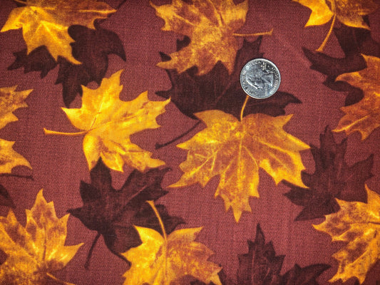 Autumn Leaves on Orange/Brown from North by Northwest for Kanvas Fabrics Cotton Fabric