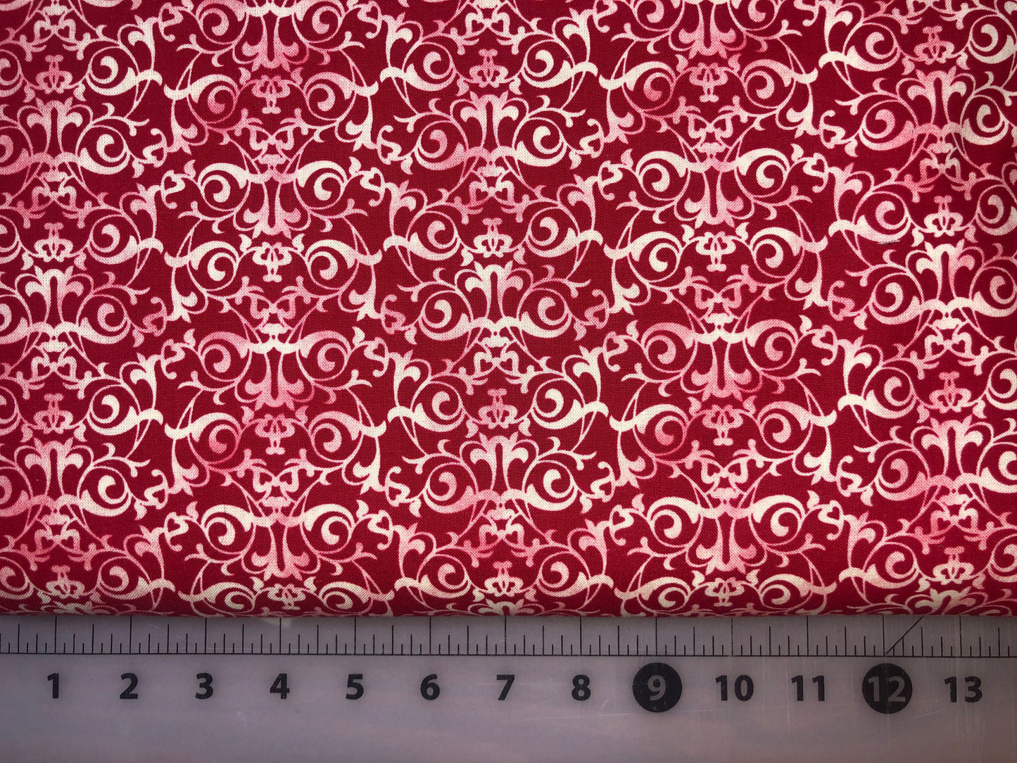 Red Scroll Print 9229-88 from Love In Bloom by Fresh Designs for Henry Glass and Co. Cotton Fabric